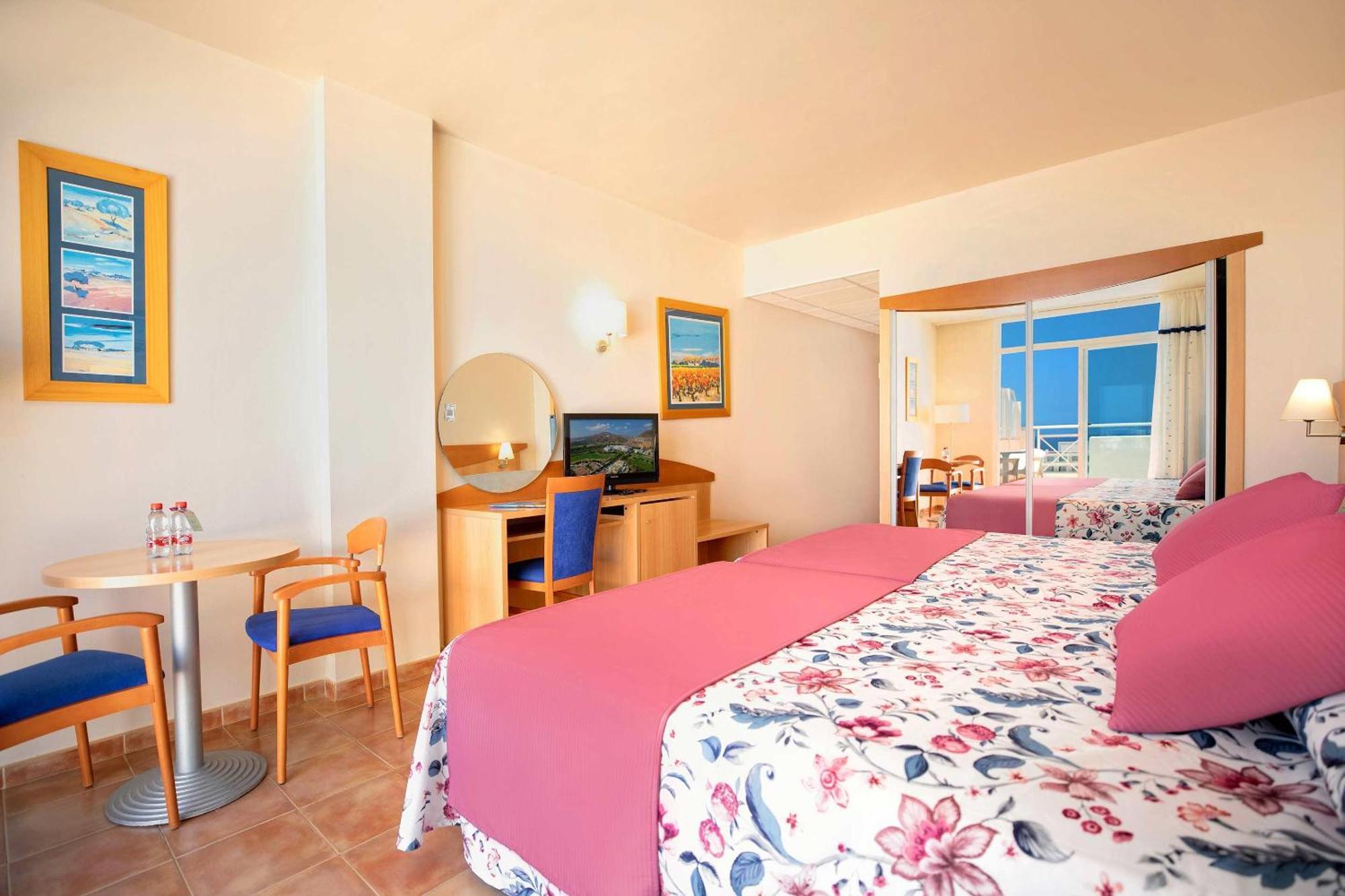Habitación Doble (2 adultos + 1 niño) - 2 camas dobles